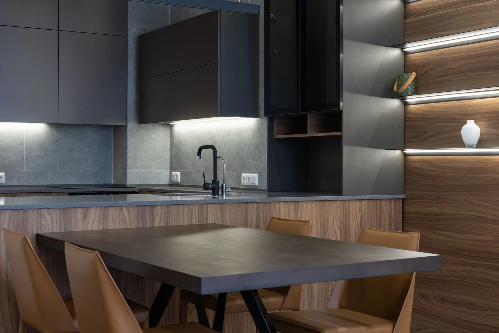 A modern kitchen with a sink cabinet, where an under sink system lives out of sight
