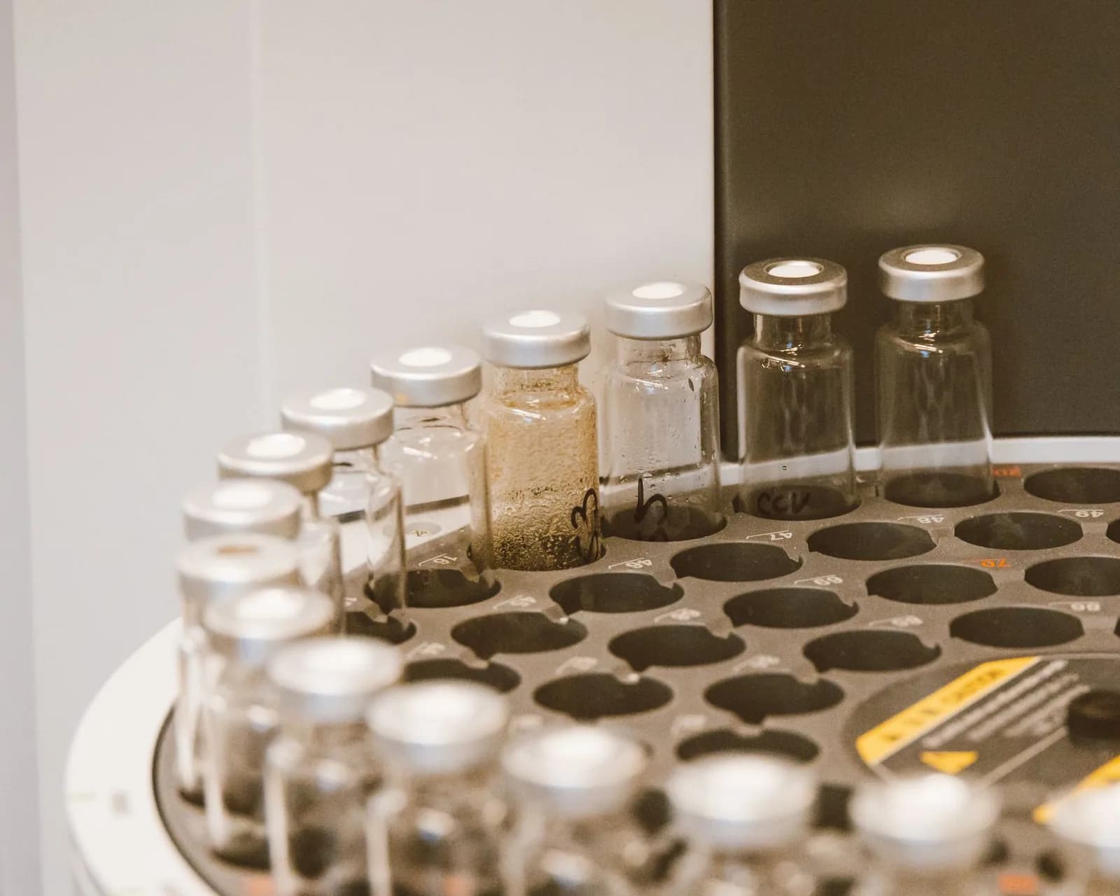 Sample vials lined up in a laboratory rack